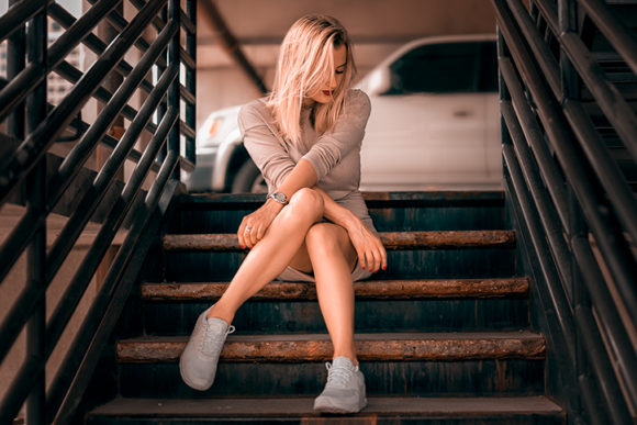 Portrait of Yana sitting on stairs